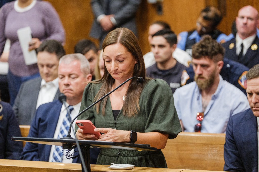 A woman gives a victim impact statement at a sentencing hearing.