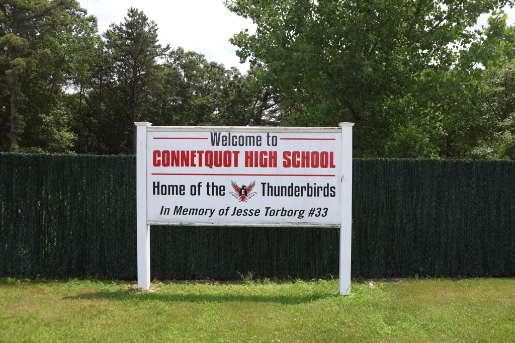 Connetquot High School sign: Home of the Thunderbirds.  In memory of Jesse Torborg #33.