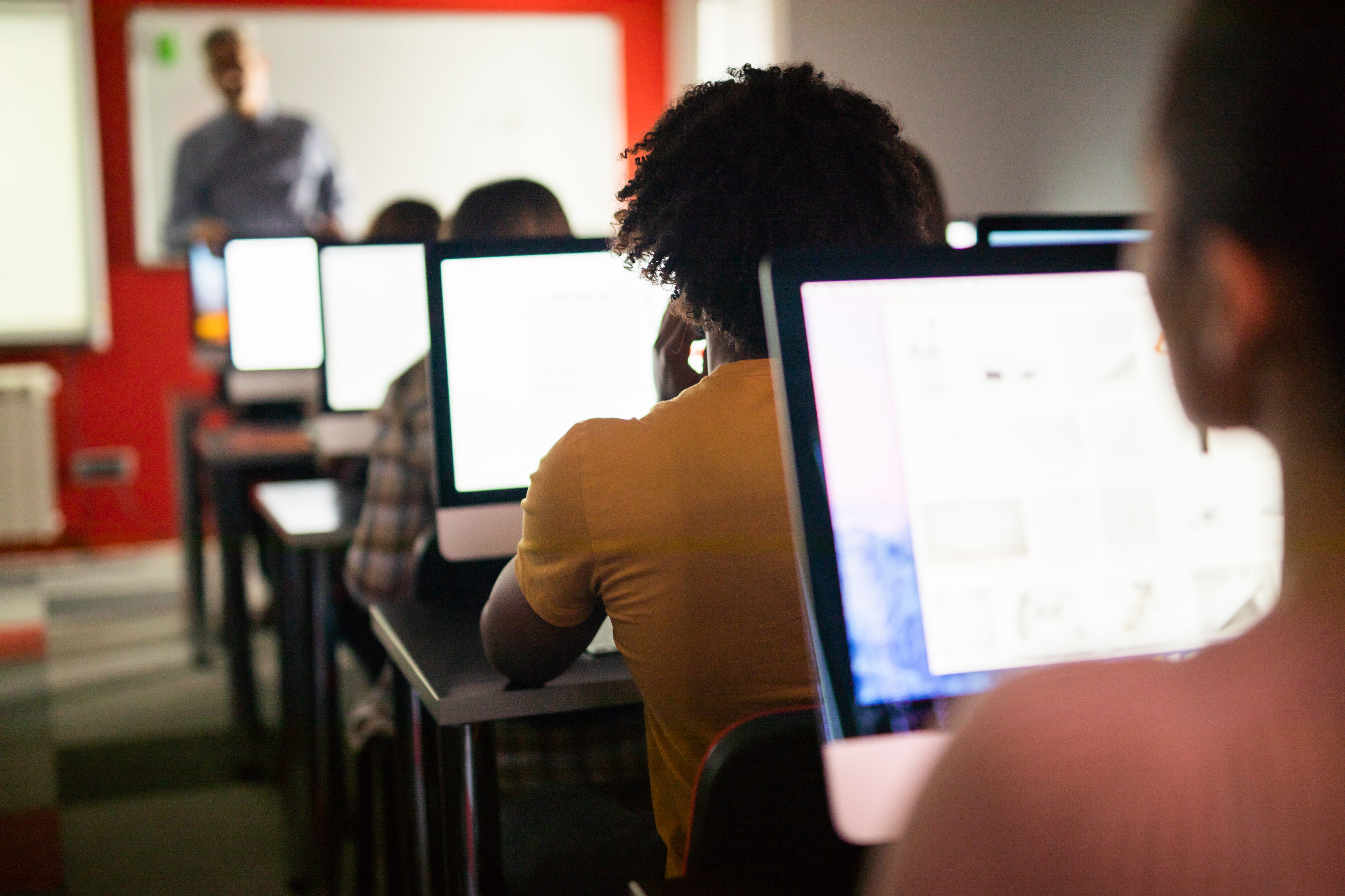Student use their computers on a classroom.