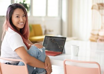 A millennial paid off six figures in debt and built a $1 million net worth. She explains how she invests her money.