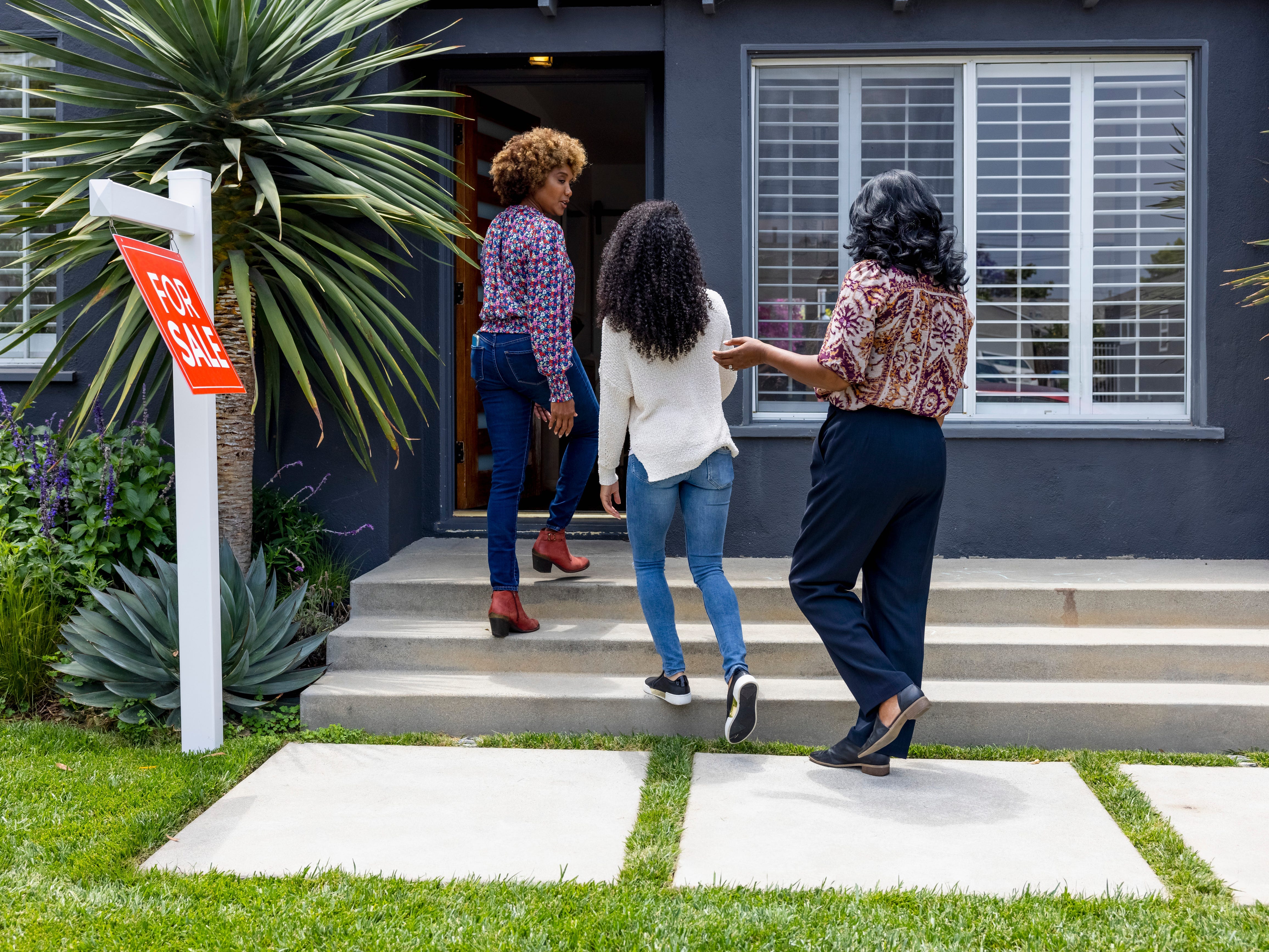 People looking at a home for sale