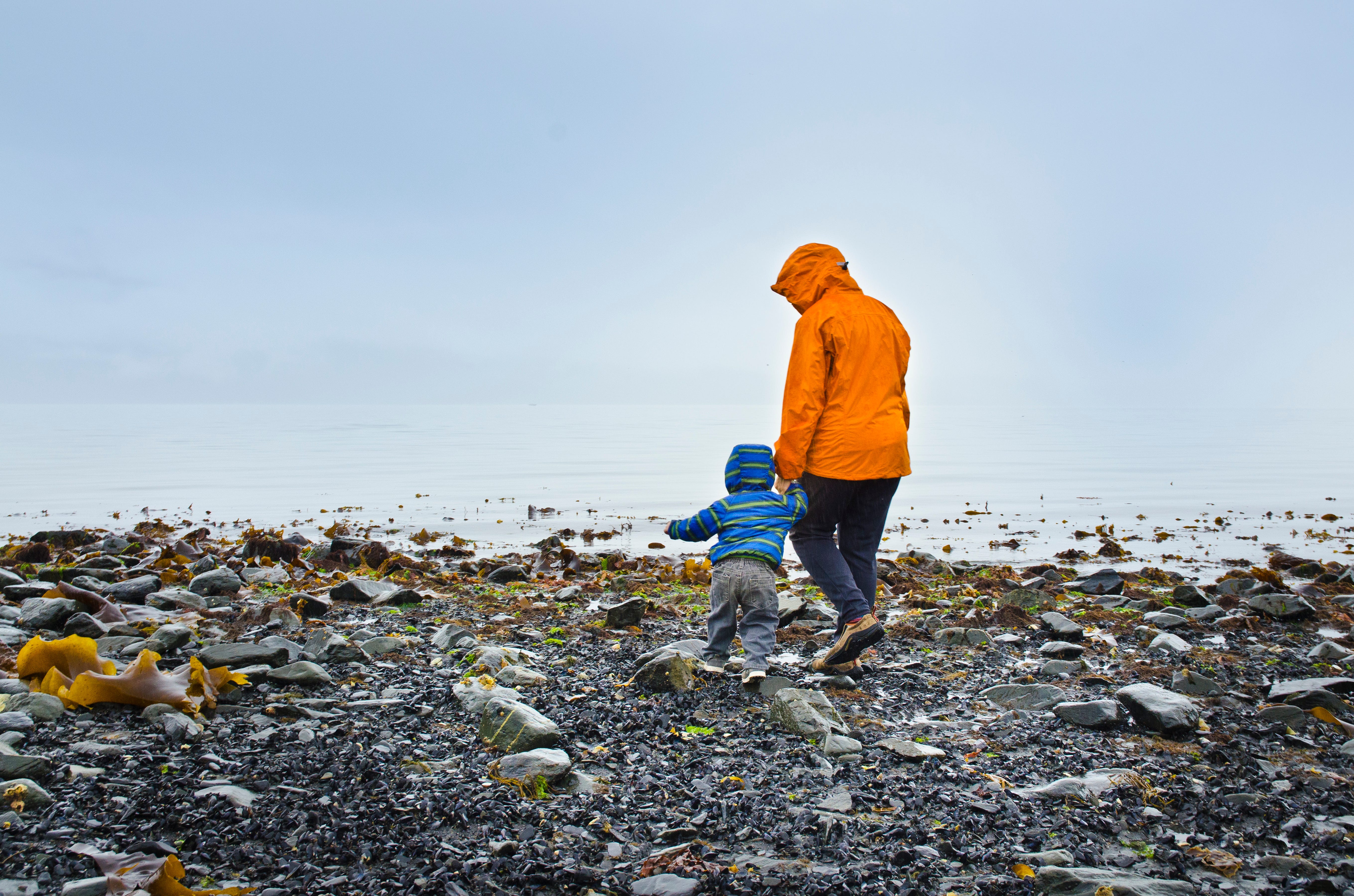 Back of parents and child in Alaska
