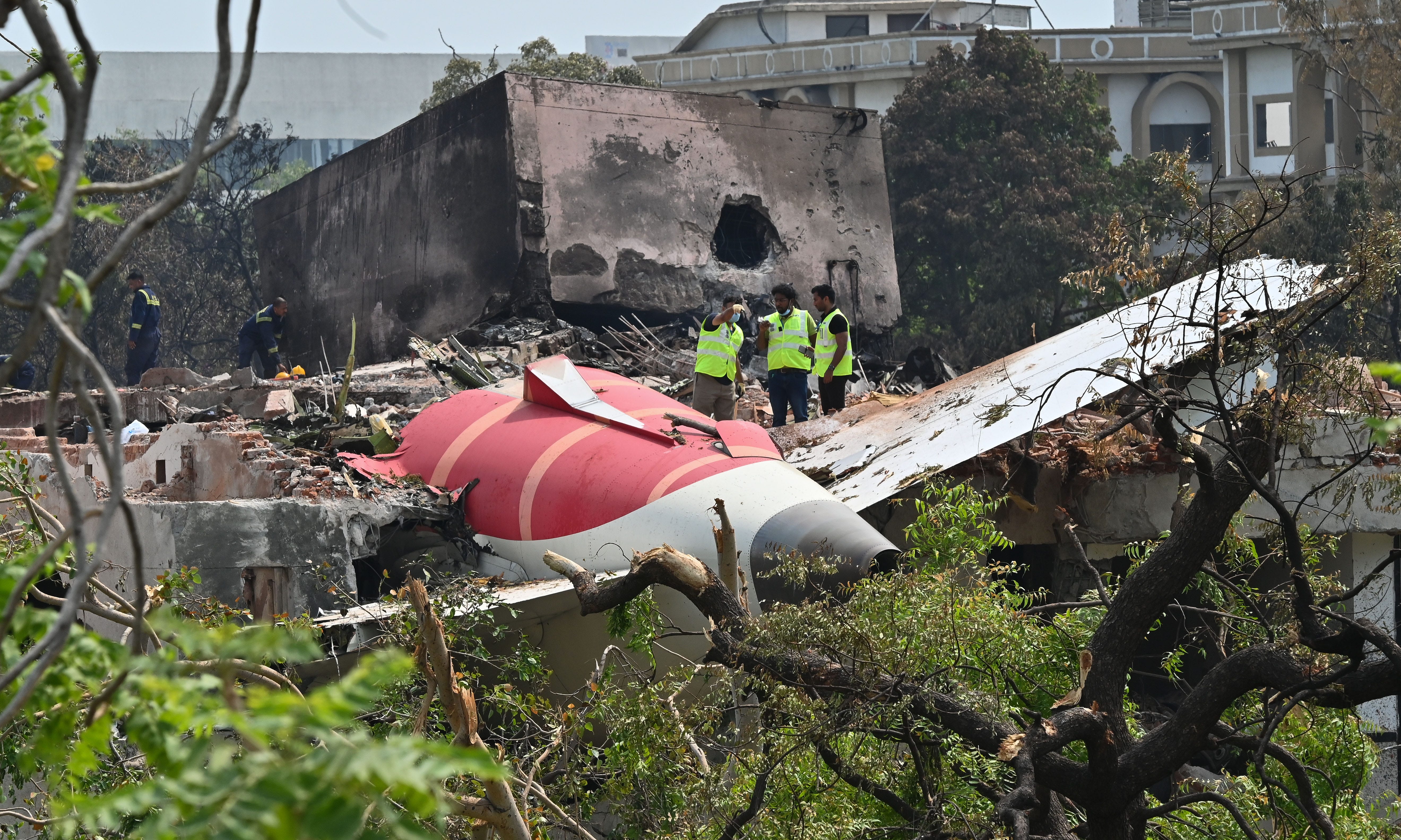 Forensic experts and DGCA officials searching for evidence at Air India Plane crash site, on June 13, 2025.