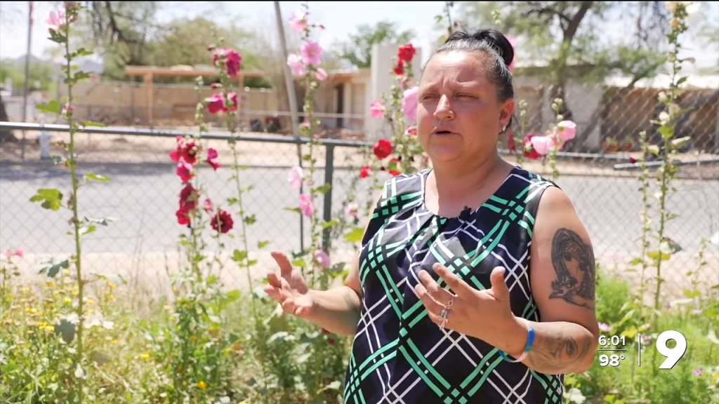 Neighbor Christine Carino claimed immigration officers disguised themselves as city workers to try to get into a home