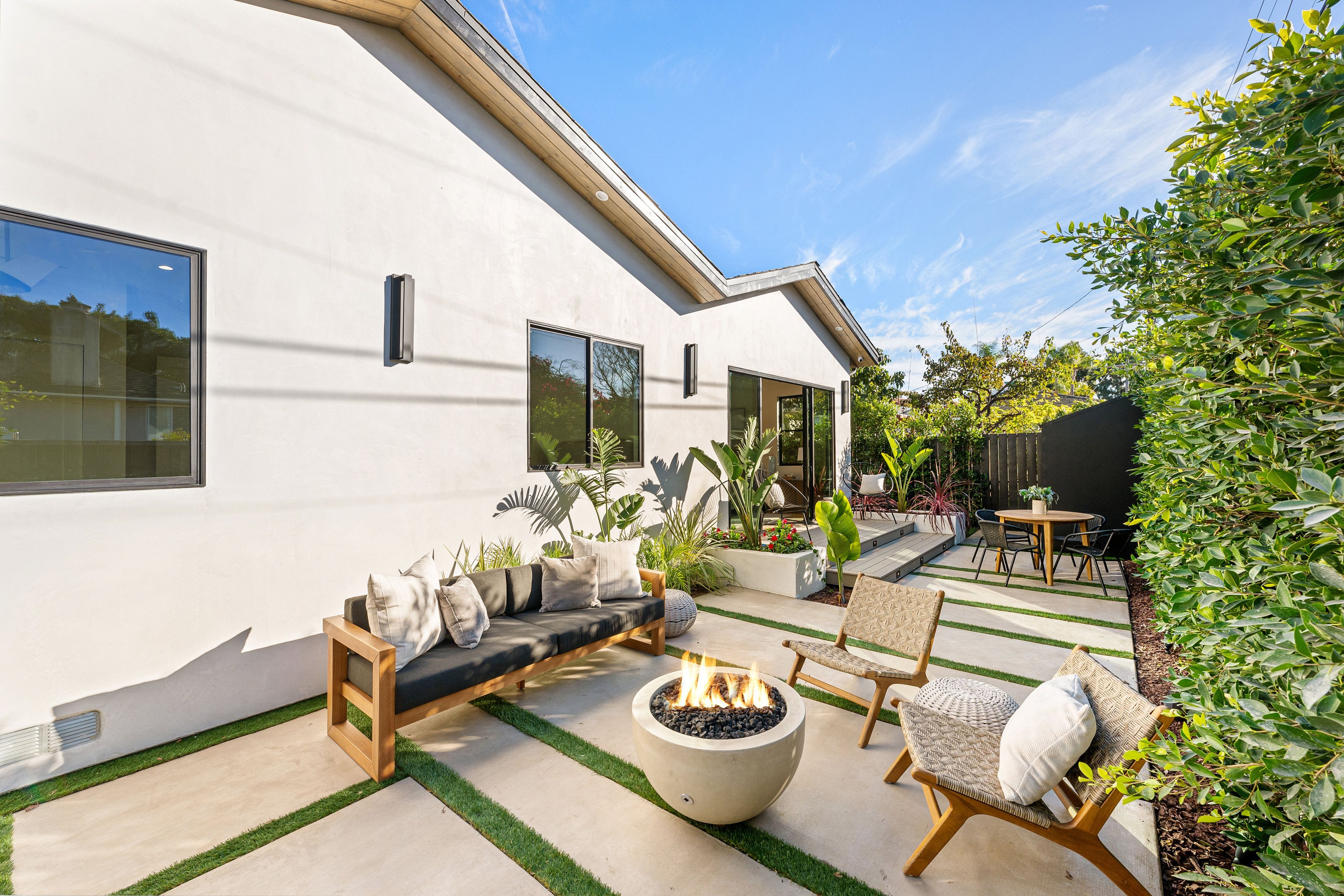 Ourdoor patio with furniture, fire pit