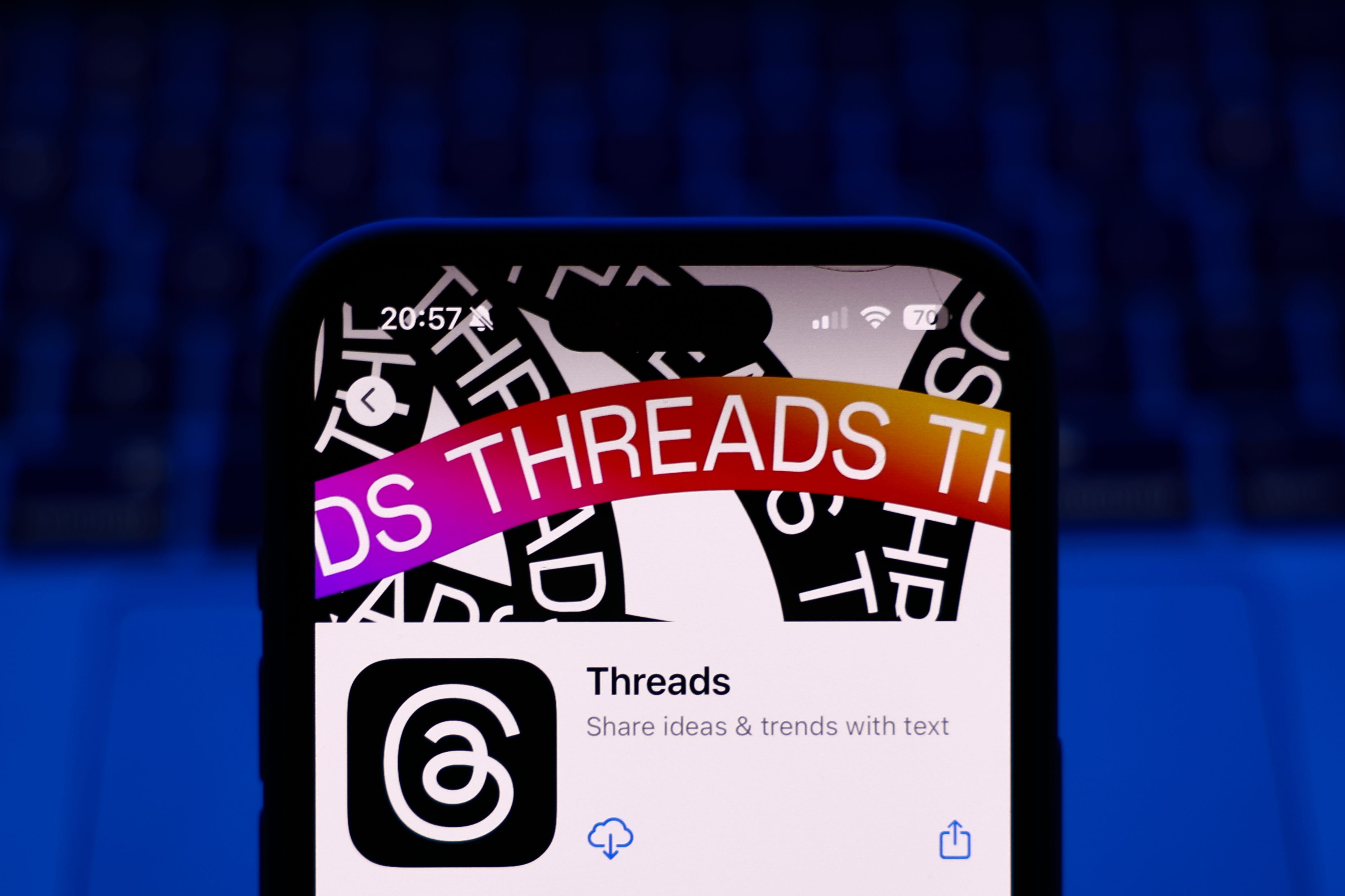 The top of an iPhone screen with the Threads page on the App Store.