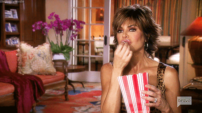gif of Lisa Rinna eating popcorn