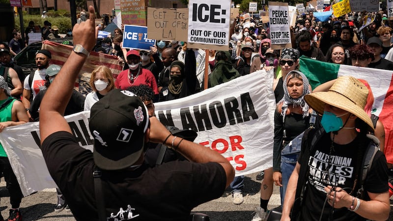 People attend a rally in downtown Los Angeles, California, U.S. June 9, 2025.