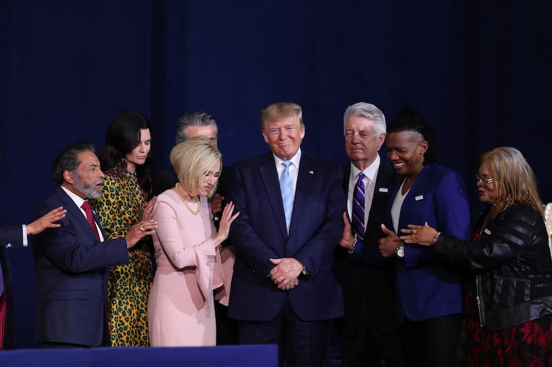 Michael Tait (second from right) prays over President Donald Trump with other faith leaders during a "Evangelicals for Trump" campaign in 2020.