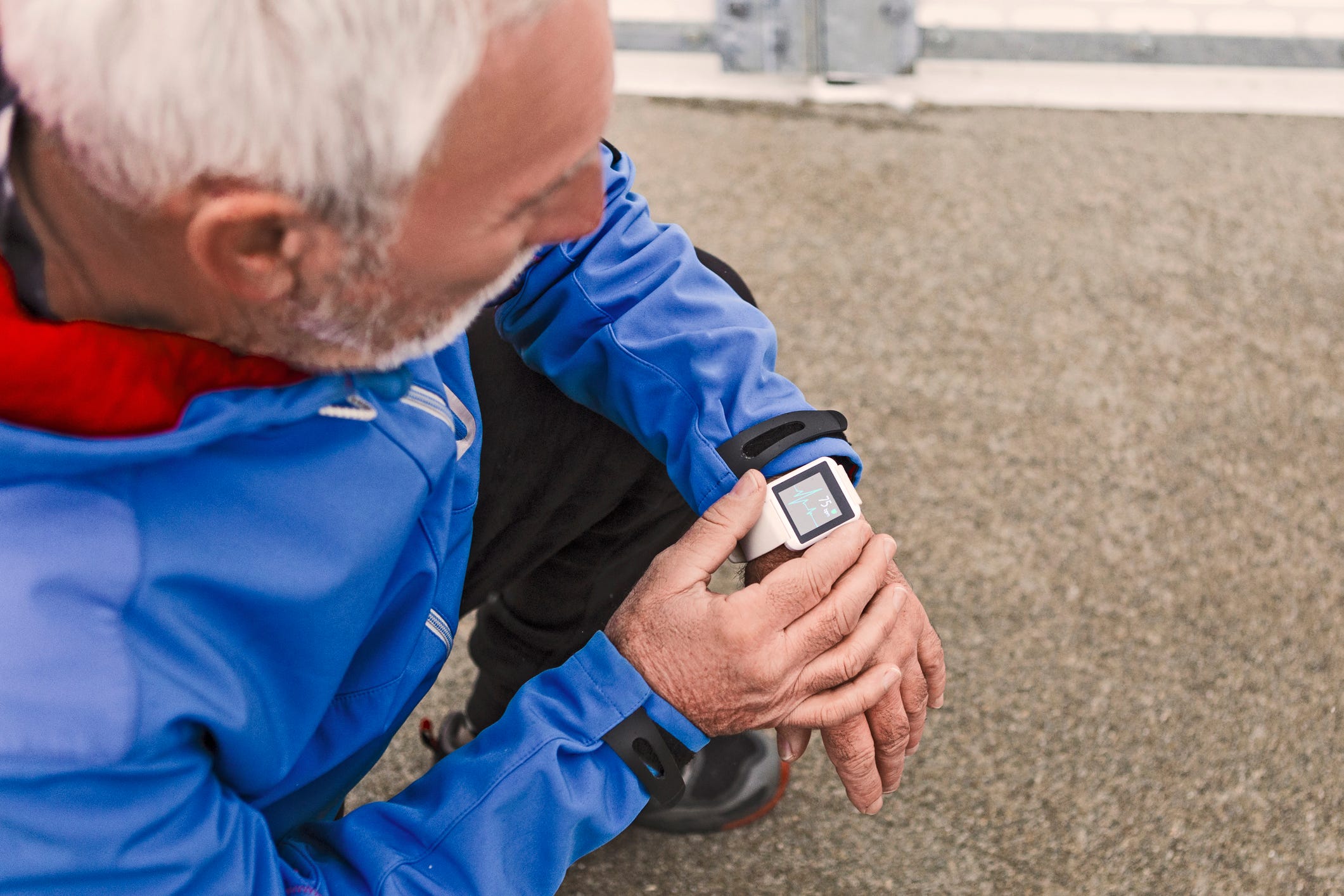 man walking with smartwatch
