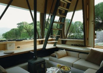 EDWorks. Brings Cozy Conversation Pit to Woodland Cabin