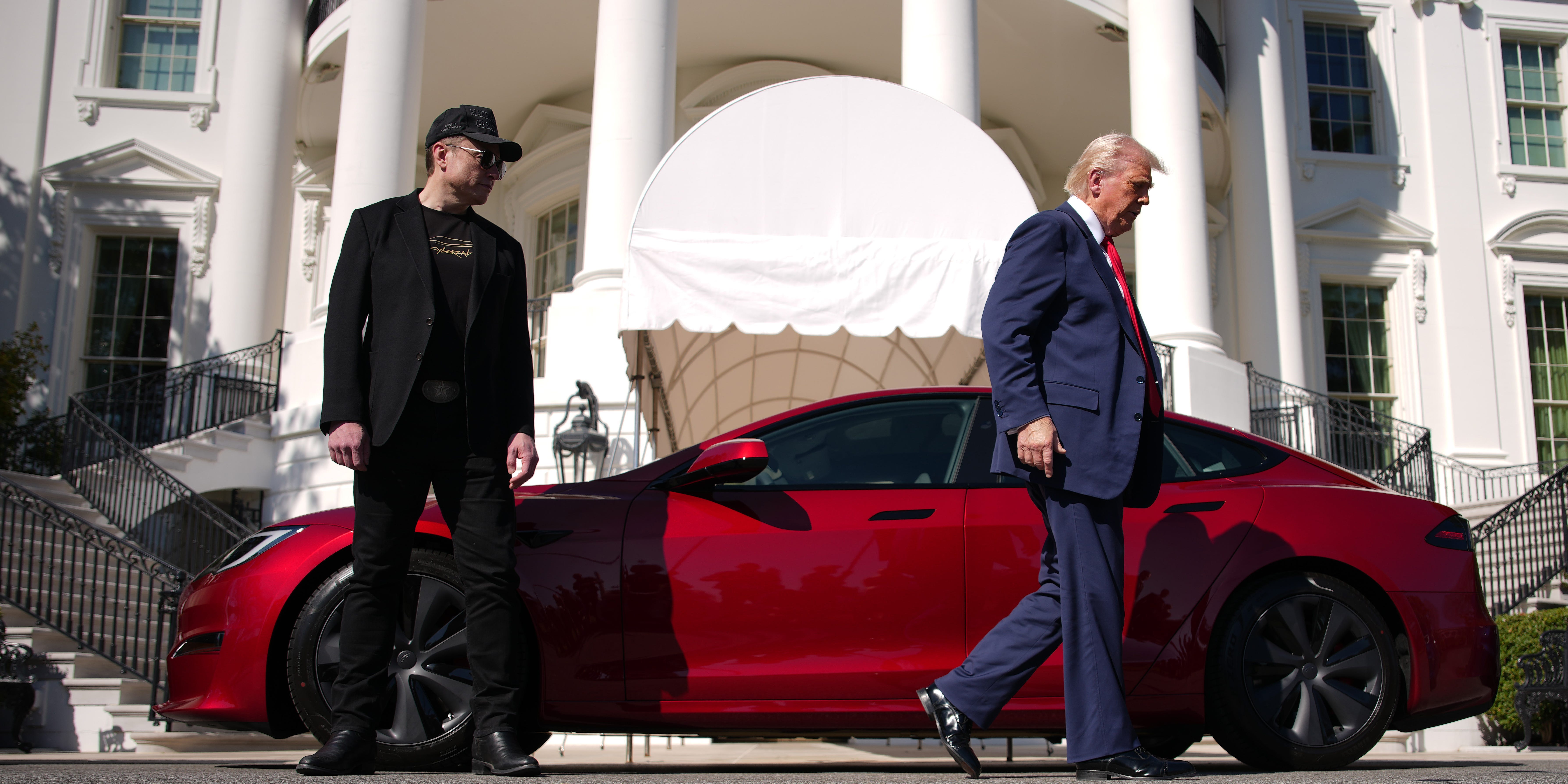 Elon Musk next to Donald Trump