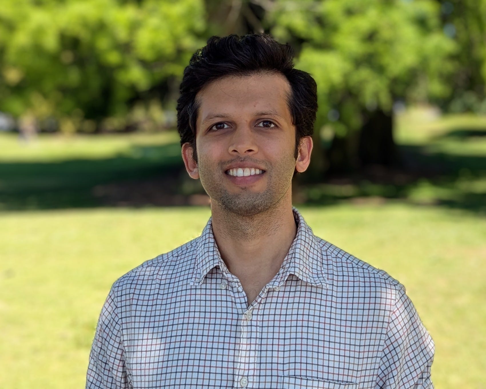 Akshay Phadké smiles at the camera