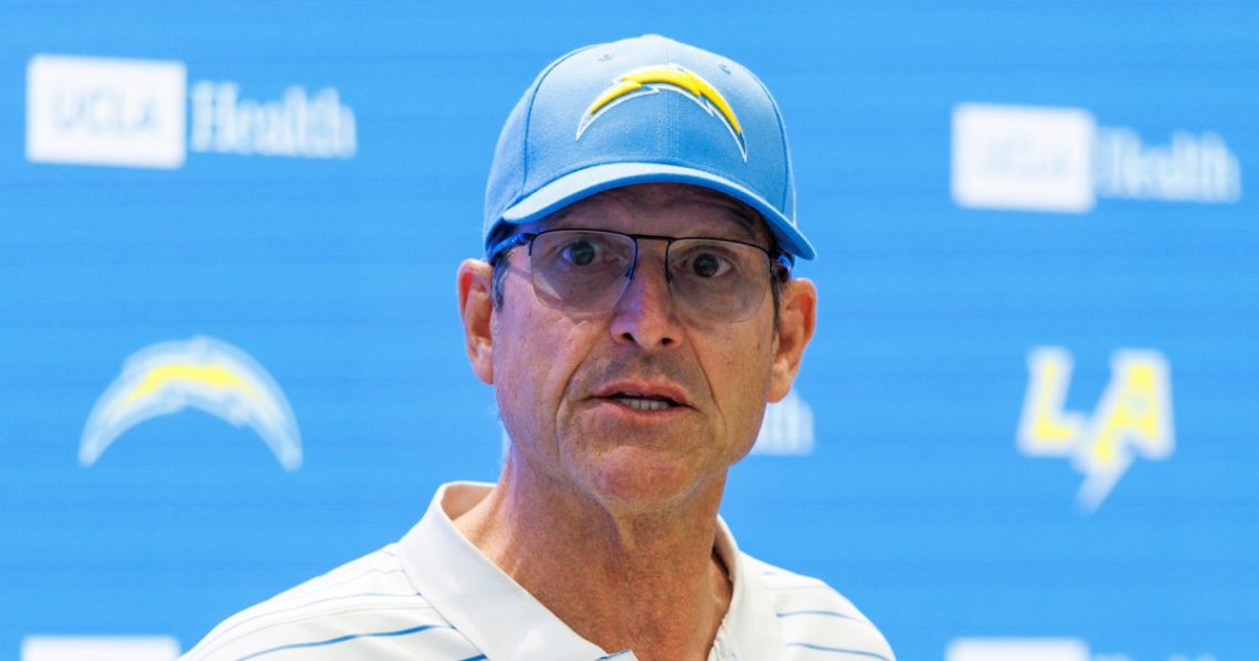 Former University of Michigan coach Jim Harbaugh named in class action suit against Matt Weiss