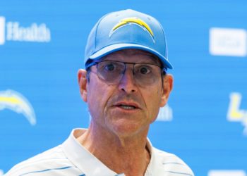 Former University of Michigan coach Jim Harbaugh named in class action suit against Matt Weiss