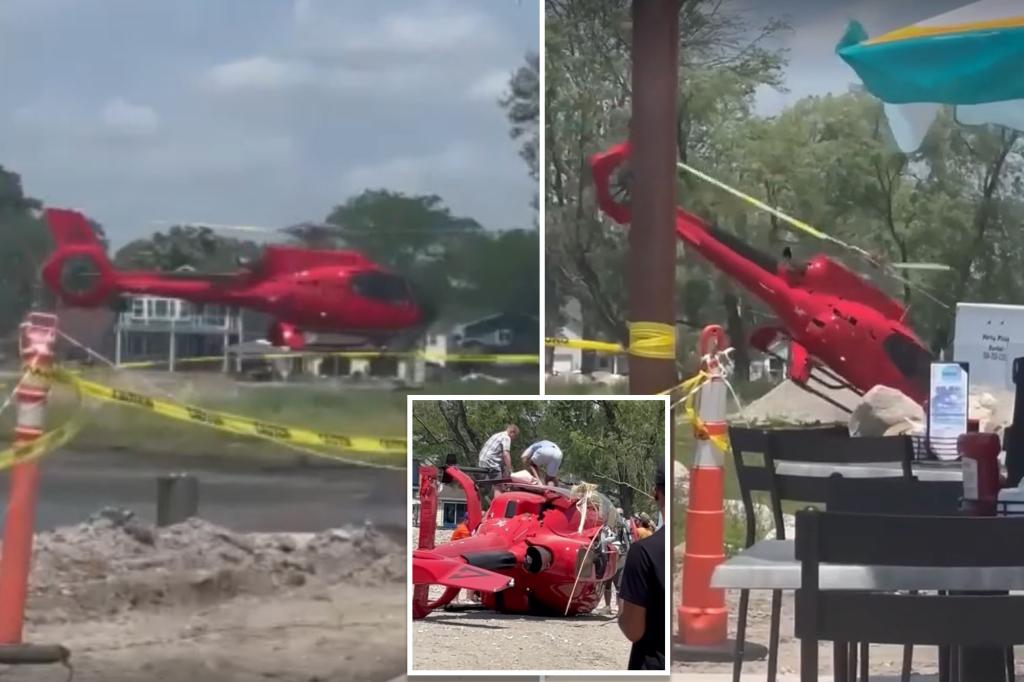 Helicopter crashes near Michigan lake, sending diners at waterfront restaurant running