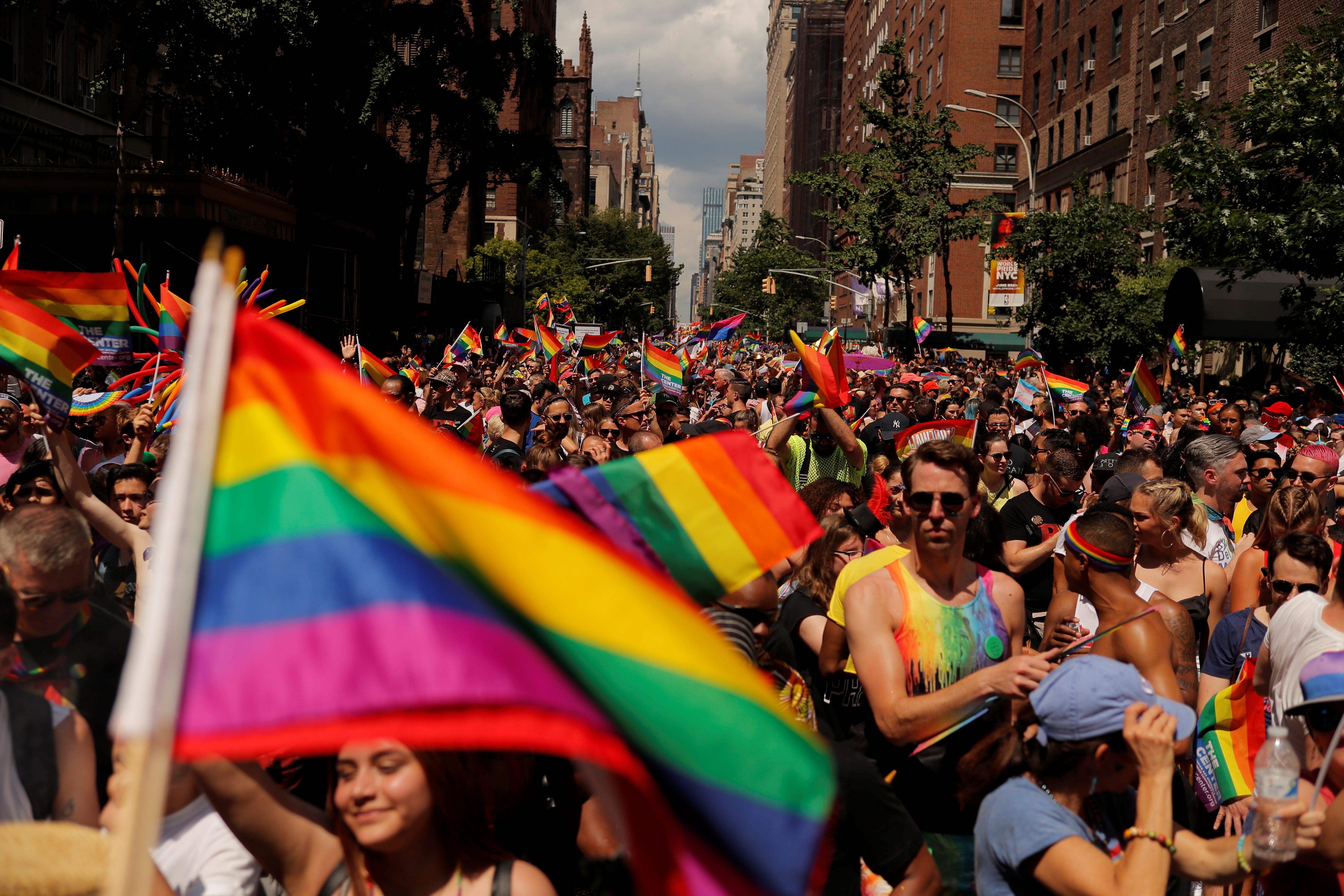 Marchers walk down 5th Avenue as they part in the 2019 World Pride NYC and Stonewall 50th LGBTQ Pride Parade in New York, U.S., June 30, 2019. REUTERS/Lucas Jackson
