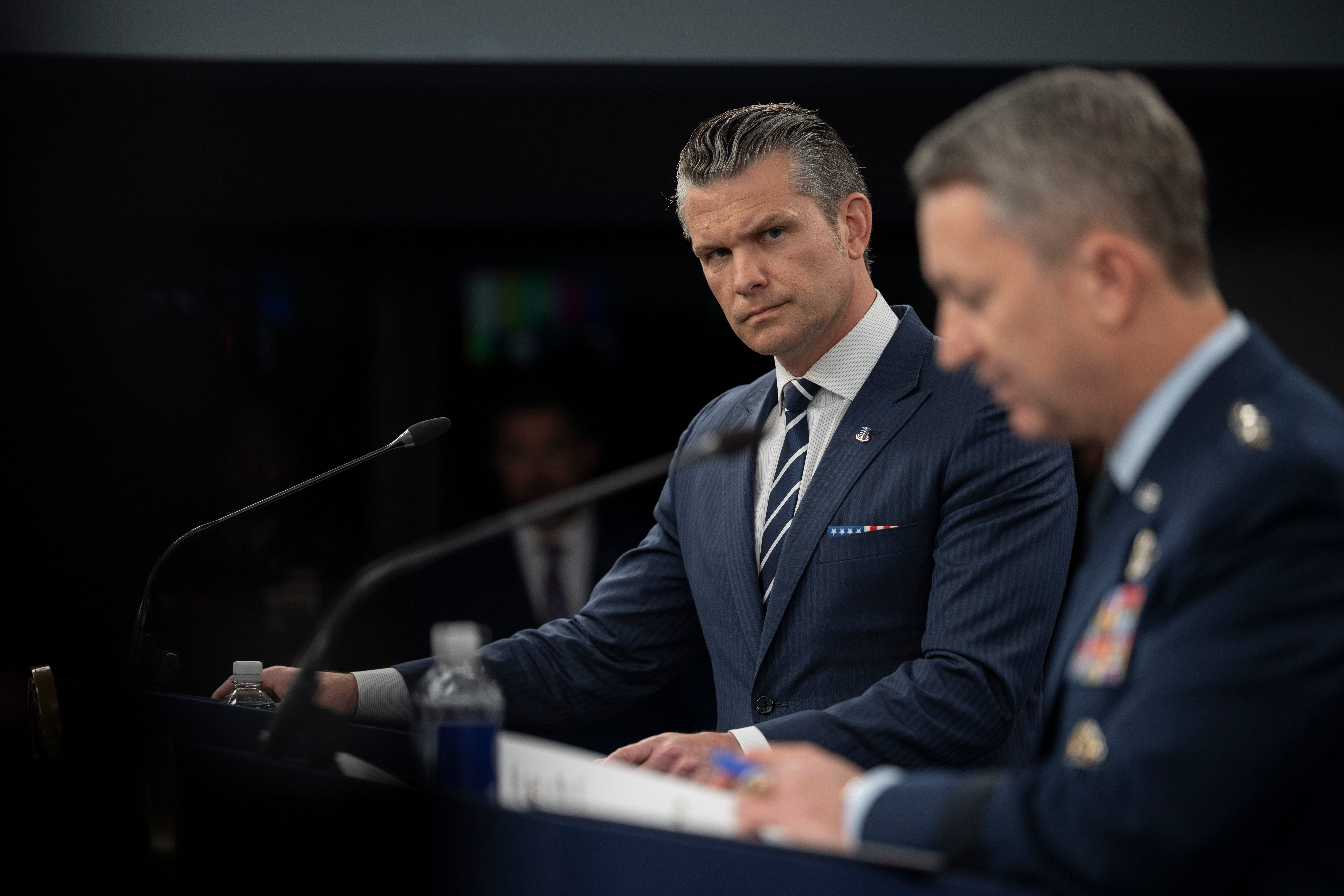 Secretary of Defense Pete Hegseth and Chairman of the Joint Chiefs of Staff Gen. Dan Caine at a rare Pentagon press briefing.