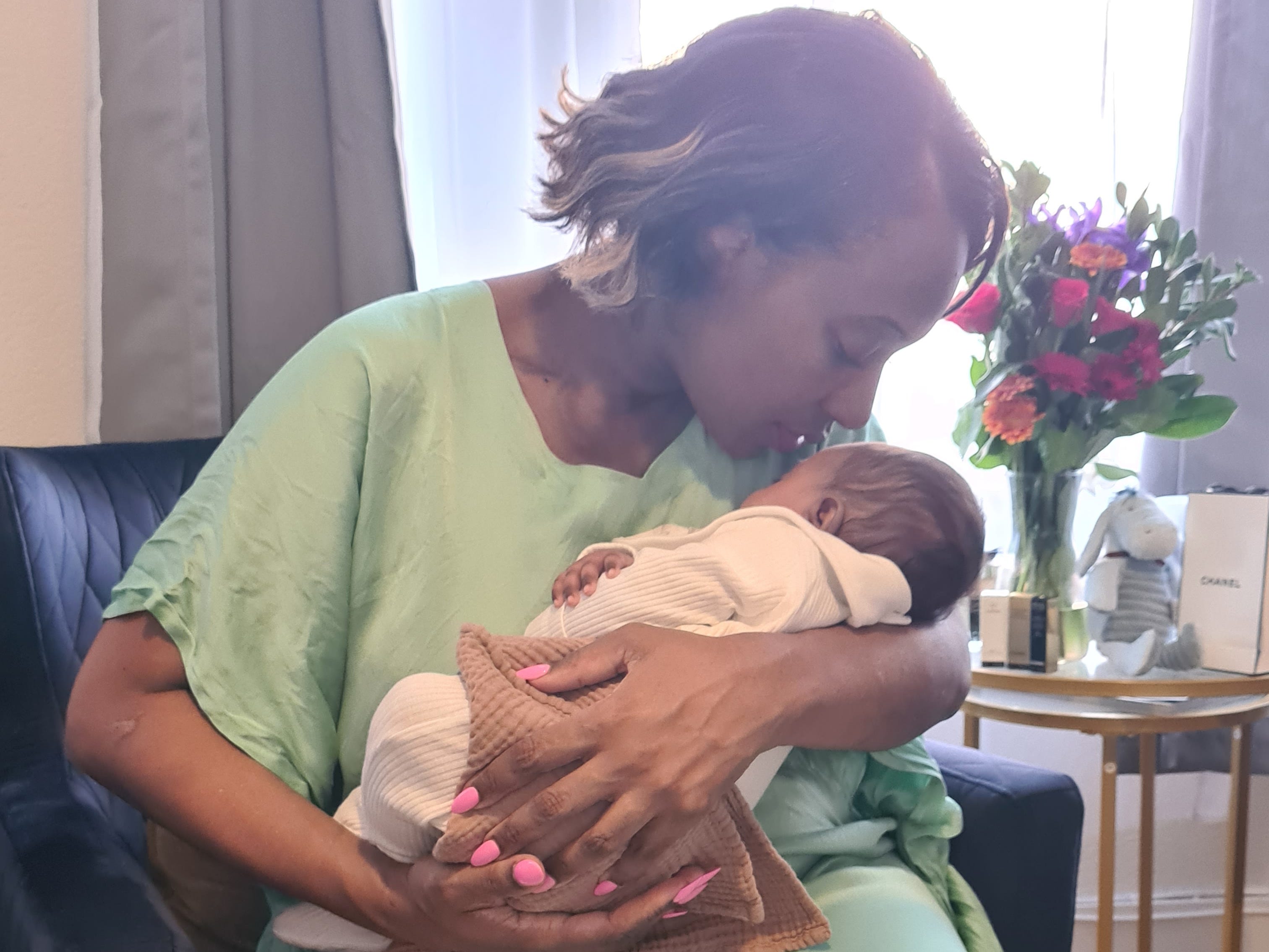 Rene Byrd holding her baby
