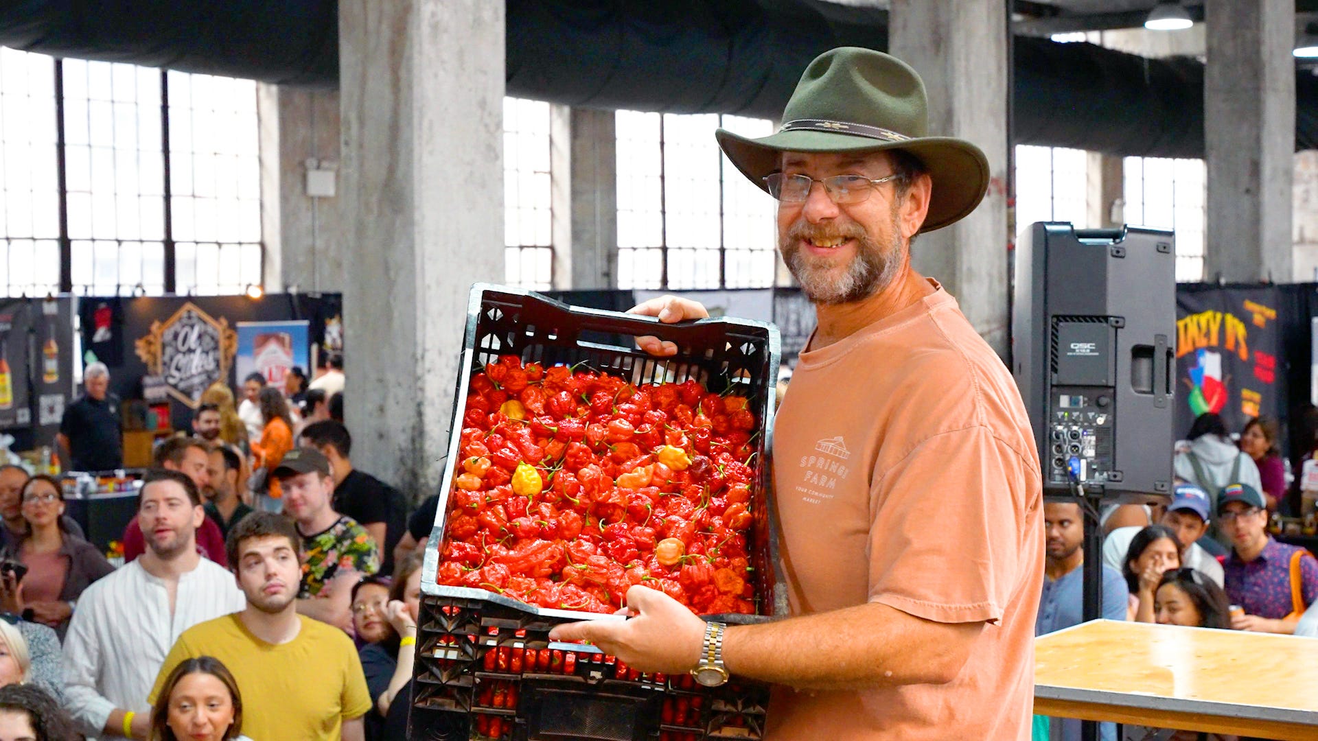 Ed Currie with a container full of hot peppers