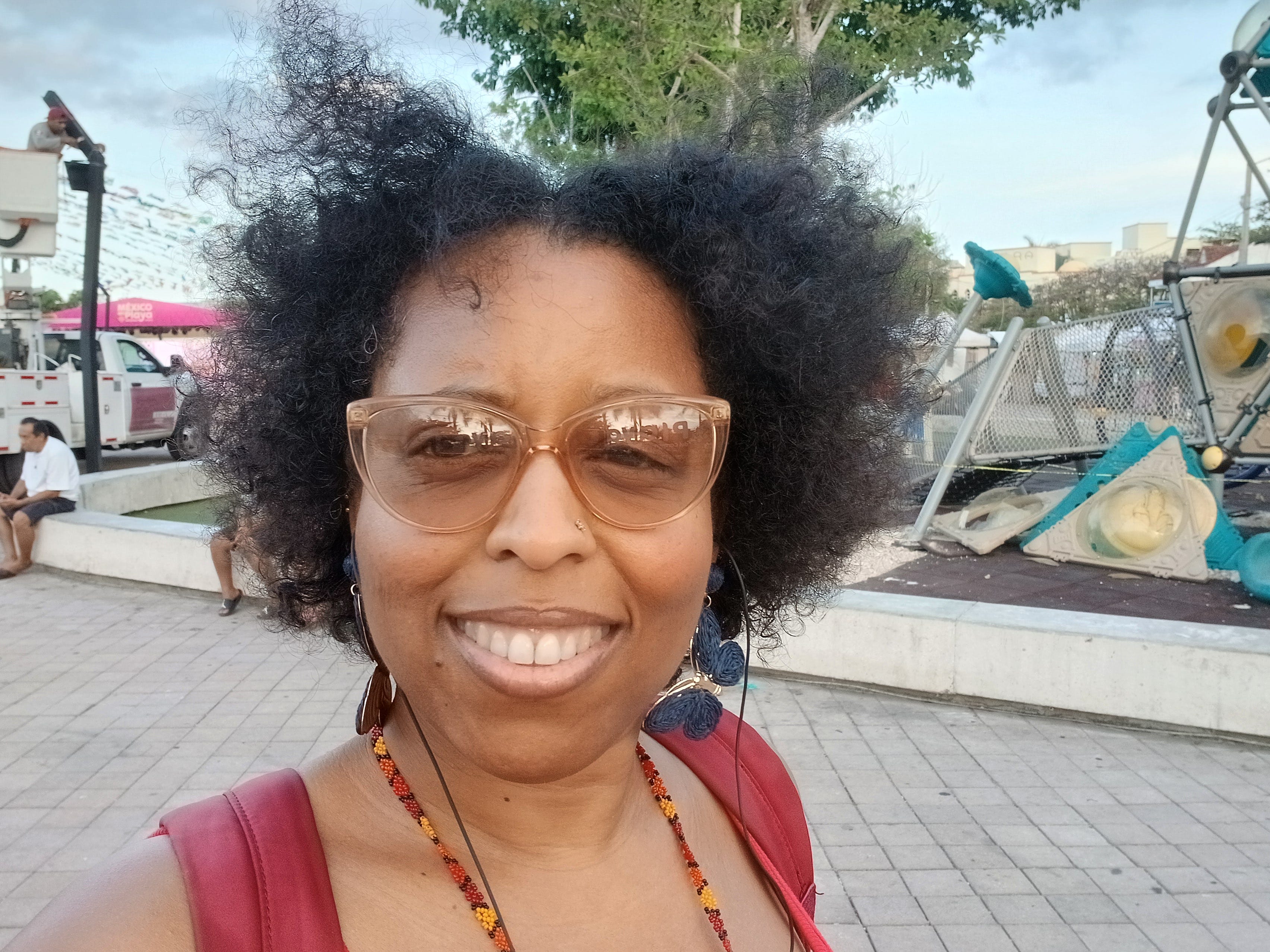 a woman takes a selfie outside