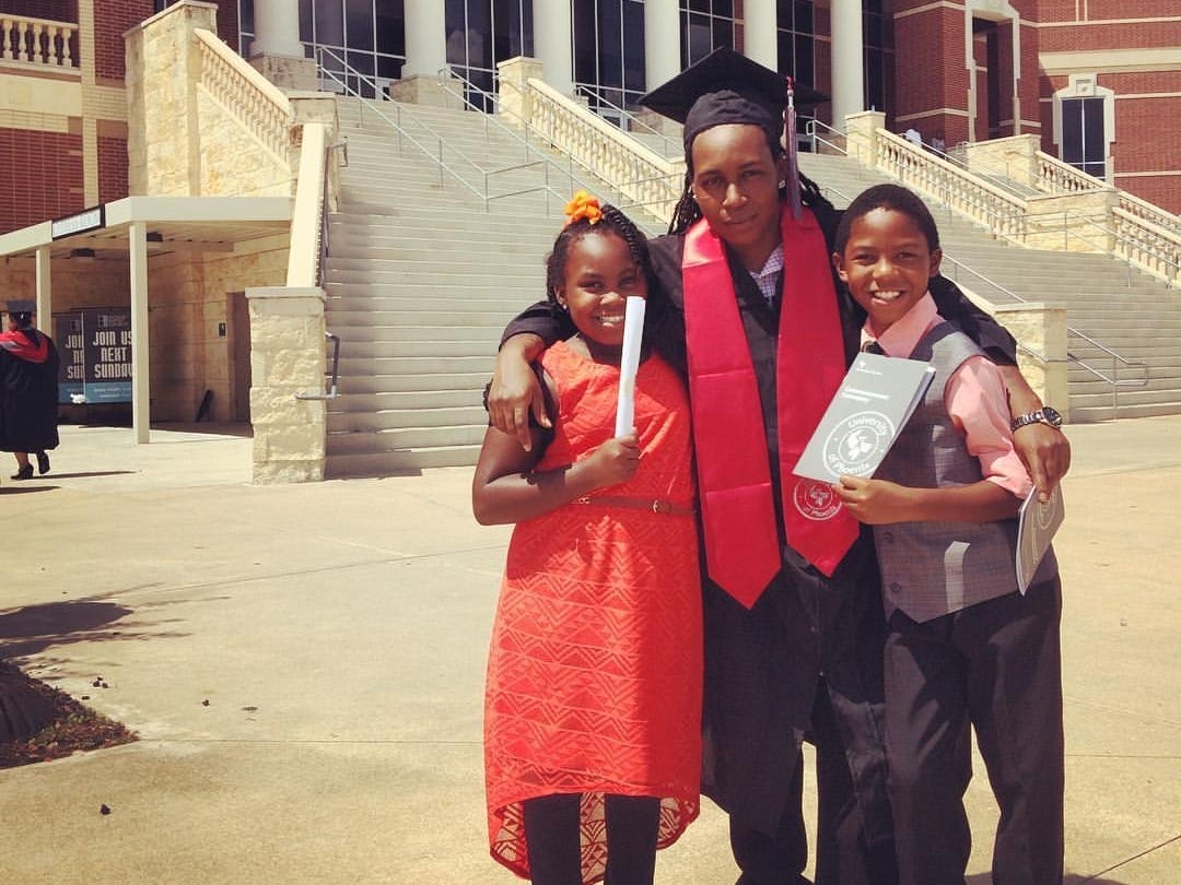 Jilian Knighten (center) with her two kids on either side of her