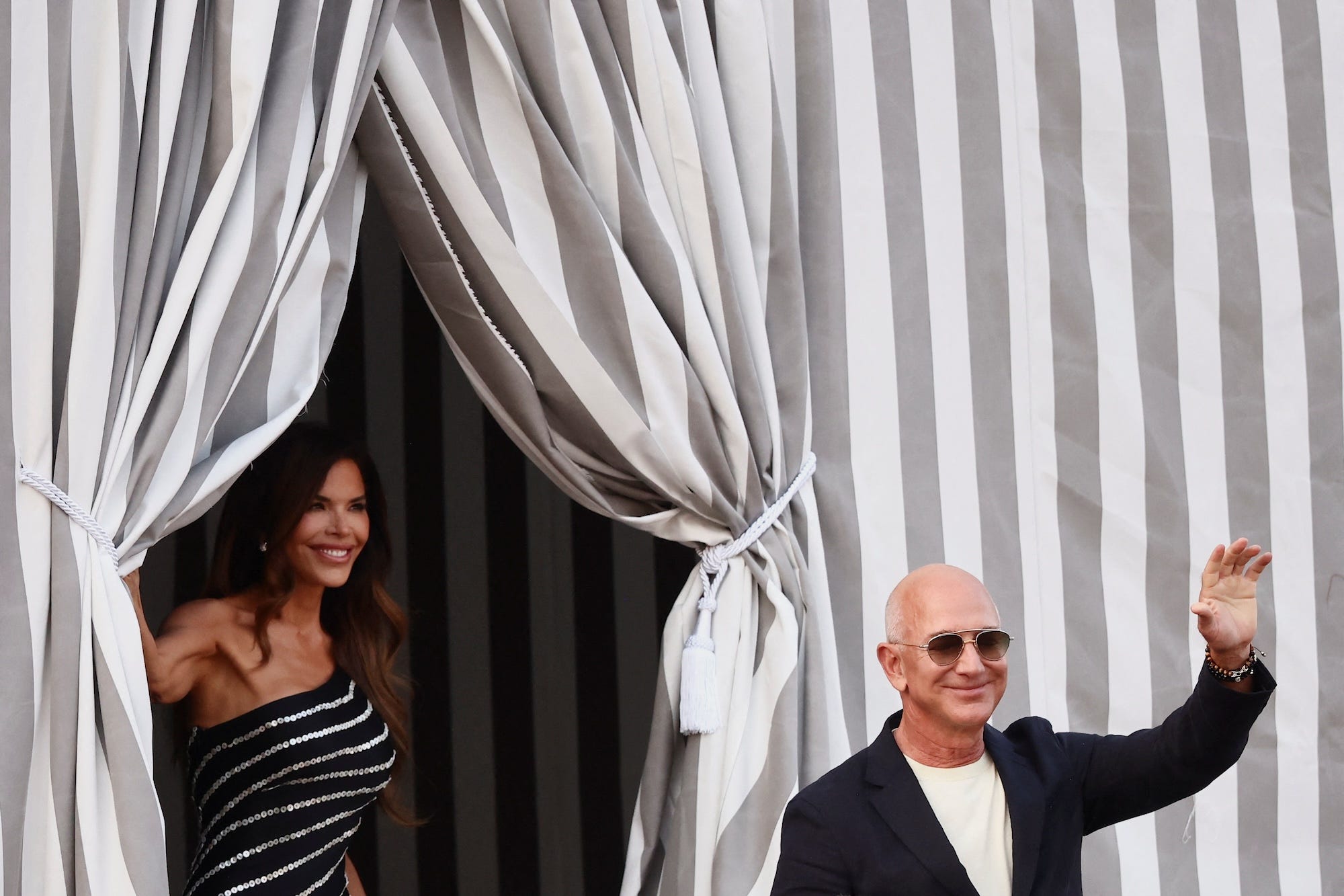 Jeff Bezos and Lauren Sánchez exiting the Aman hotel in Venice in June 2025.