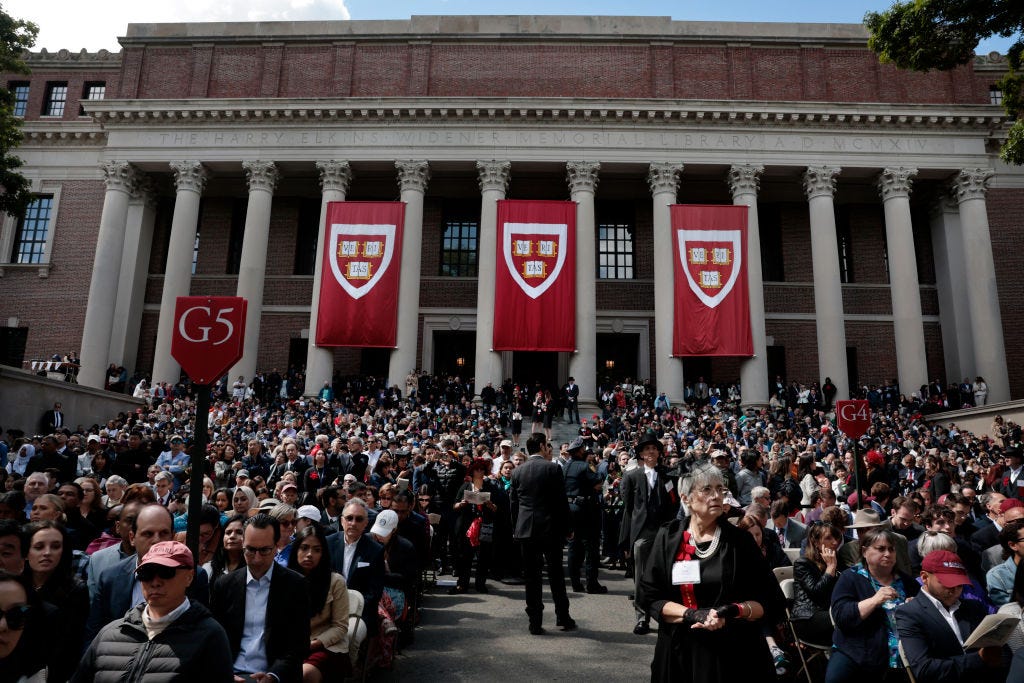 Guests watching a commencement ceremony at Harvard University.