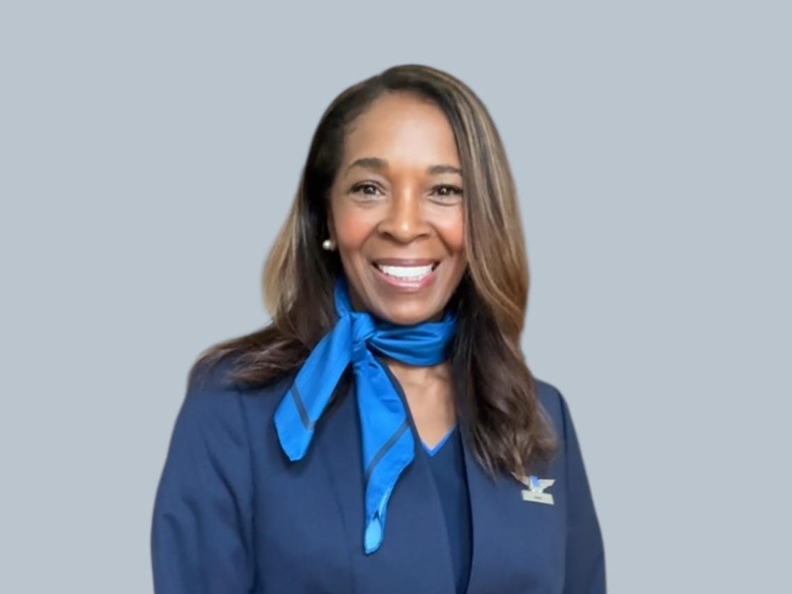 headshot of a flight attendant in her uniform