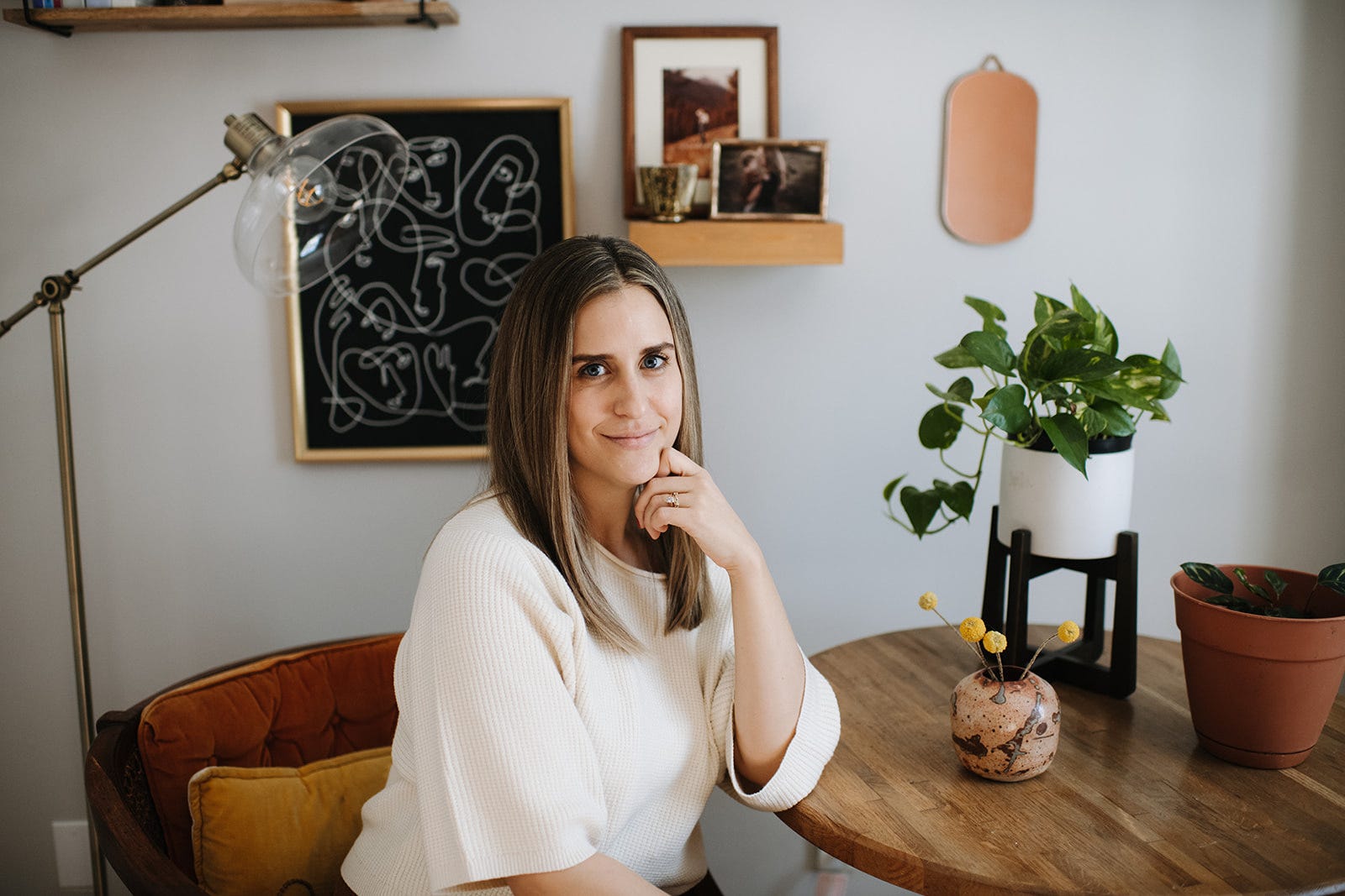 Kolina Cicero poses at a table