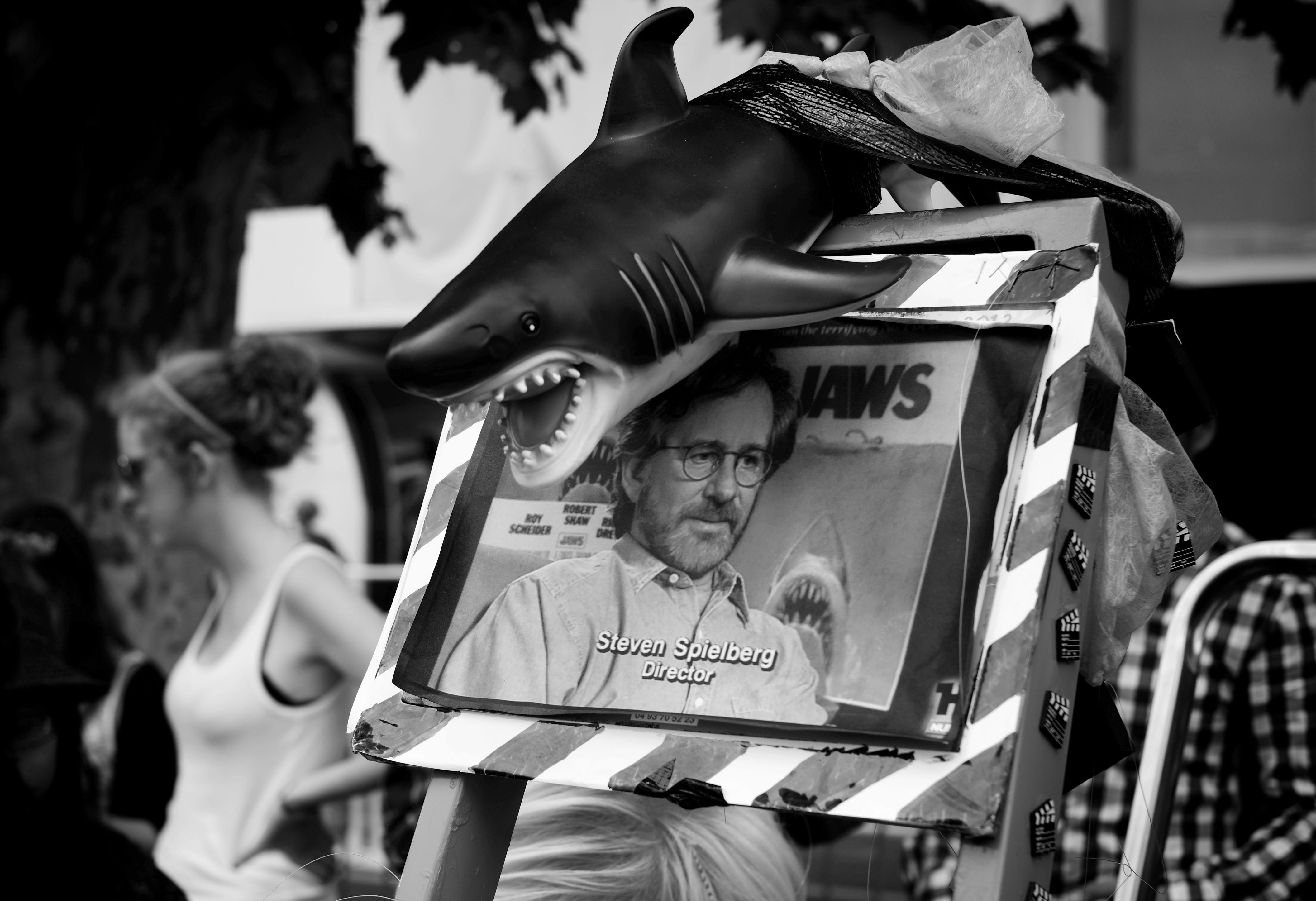 Picture of Steven Spielberg with a shark.
