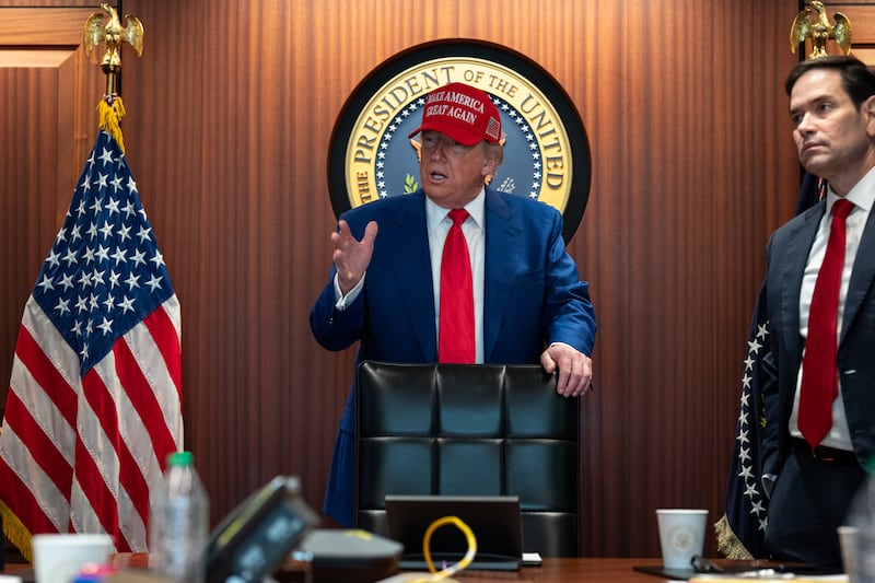 Donald Trump stands next to Secretary of State Marco Rubio in the Situation Room
