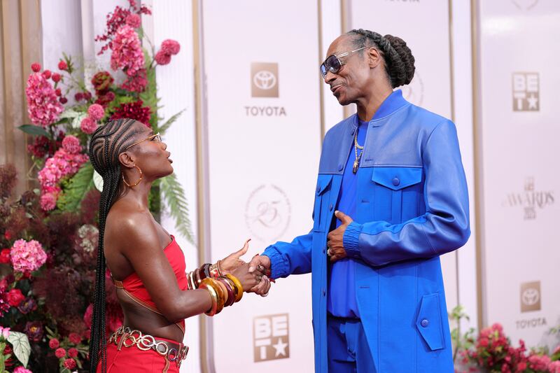 Doechii and Snoop Dogg chat at the 25th annual BET Awards.