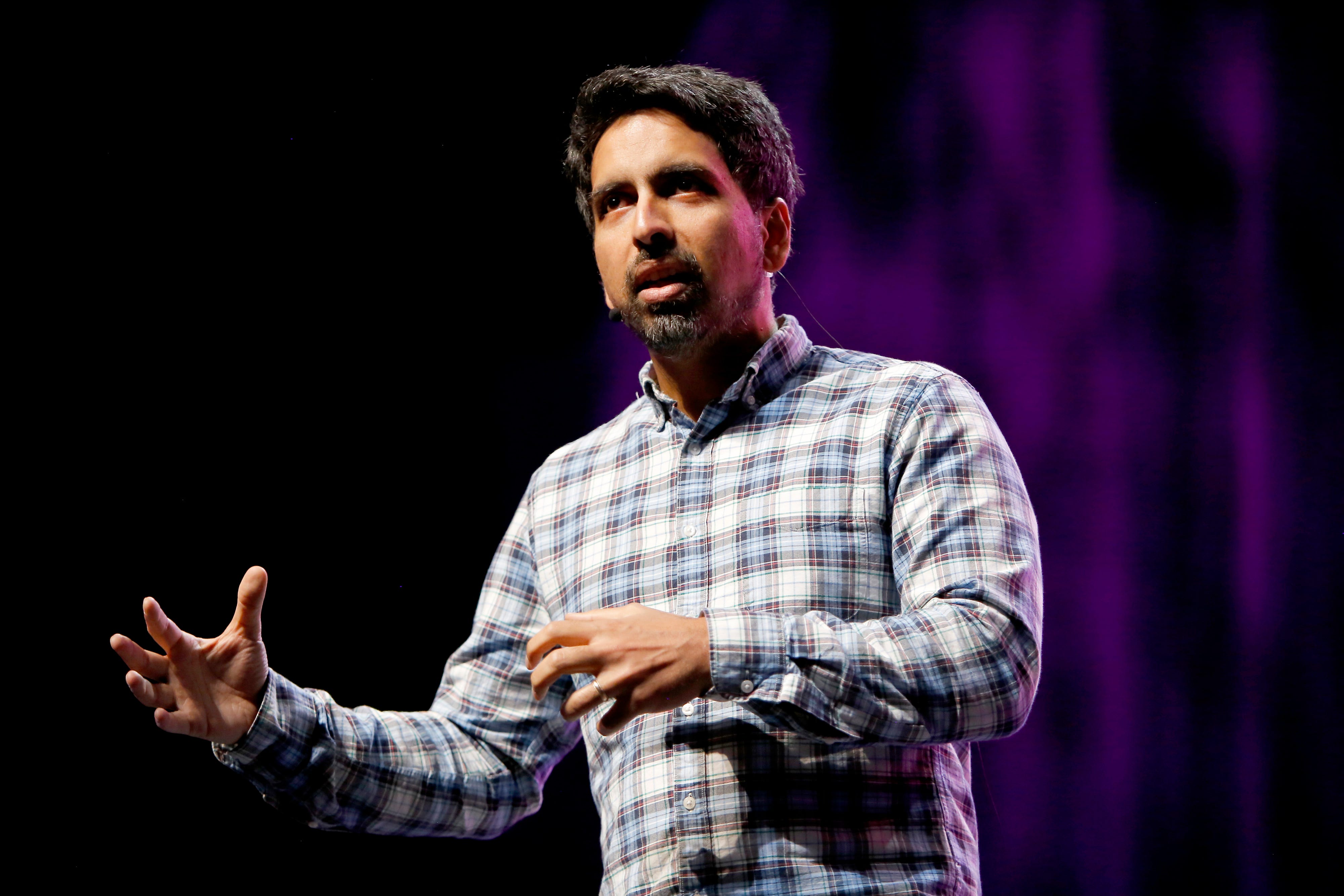Sal Khan speaking at a summit in LA in 2019