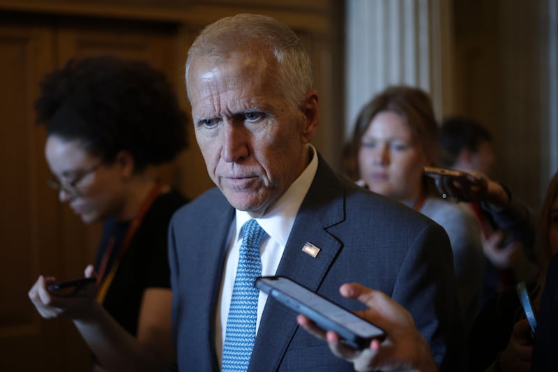 GOP Sen. Thom Tillis speaks to reporters at the U.S. Capitol on June 30, one day after announcing he won't seek re-election and blasted President Trump's