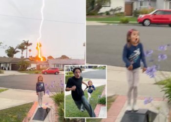 Lightning bolt strikes just behind child during California thunderstorms