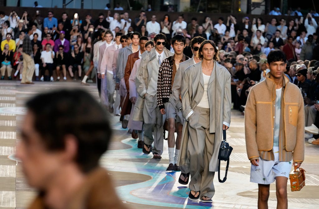 Models wear creations as part of the men's Louis Vuitton Spring-Summer 2026 collection, which was presented in Paris on Tuesday, June 24.