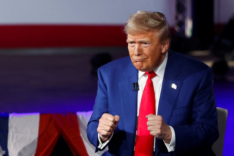 Republican presidential nominee and former U.S. President Donald Trump gestures as he attends a Fox News town hall hosted by Sean Hannity in Harrisburg, Pennsylvania, U.S. September 4, 2024.  REUTERS/Evelyn Hockstein