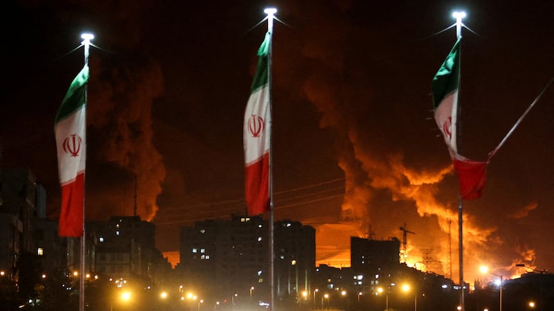 Fire and smoke rise from an Israeli attack on Sharan Oil depot on Sunday.