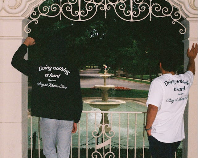 The Stay at Home Sons clothing line features T-shirts that say "Doing nothing is hard."