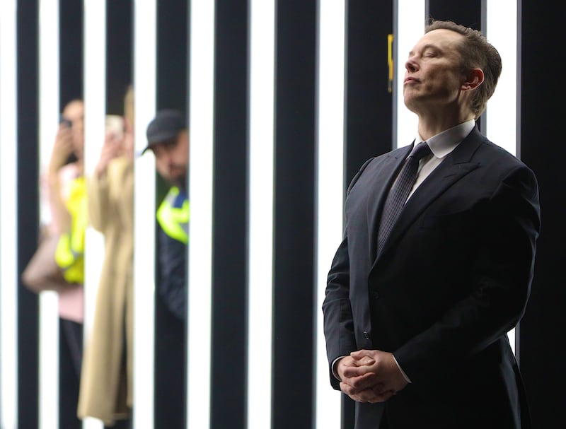 Tesla CEO Elon Musk contemplates