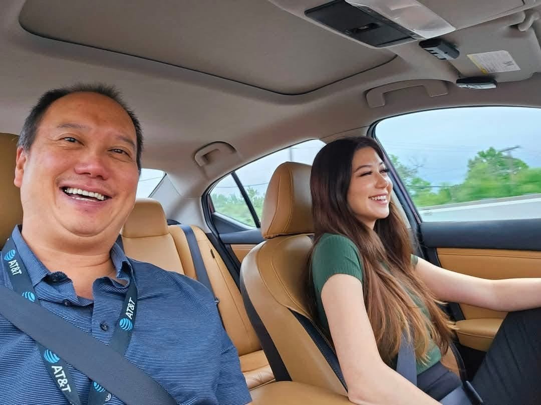 Nicole Wen and her father in the car commuting to work
