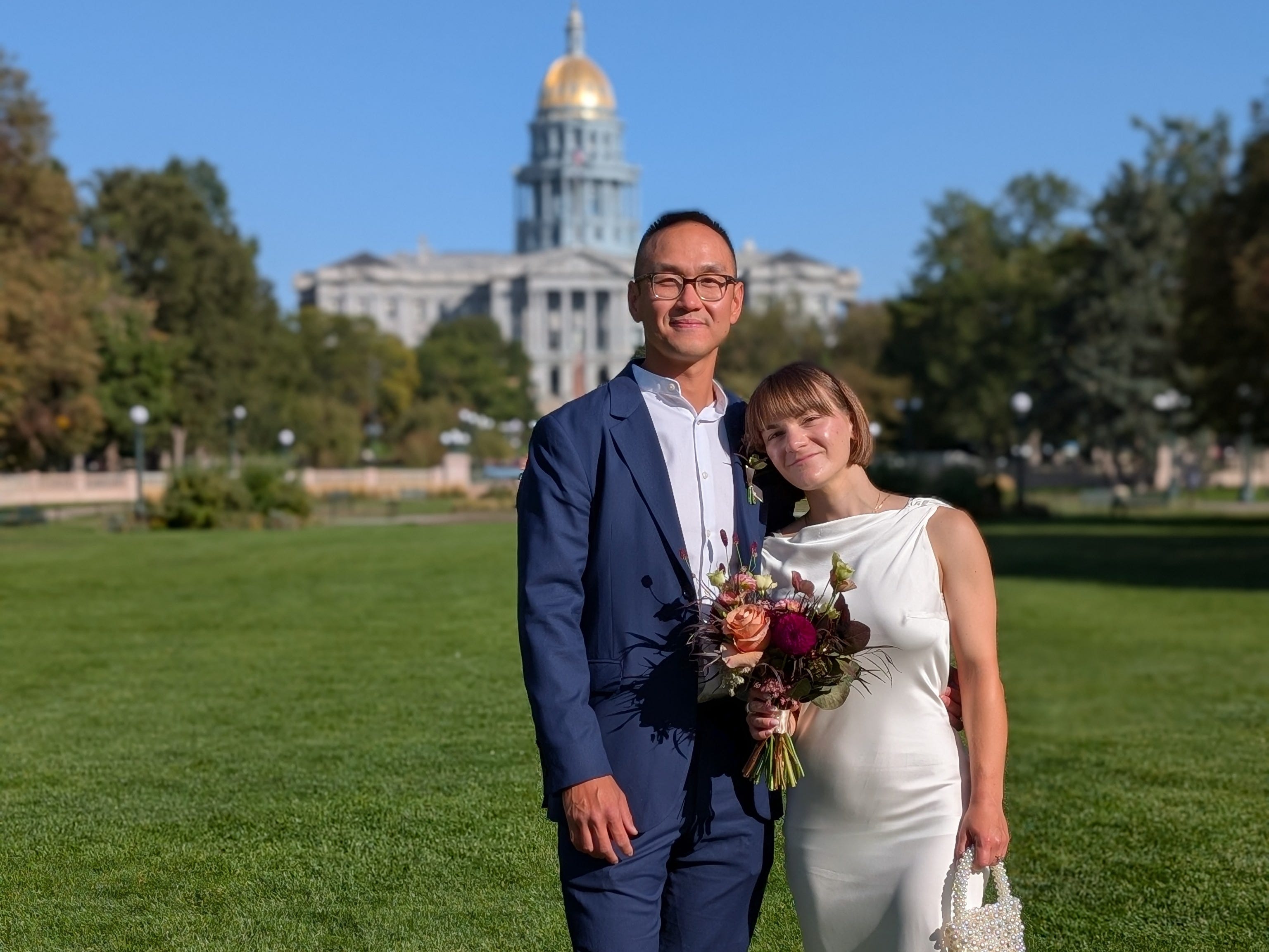 Couple posing after wedding