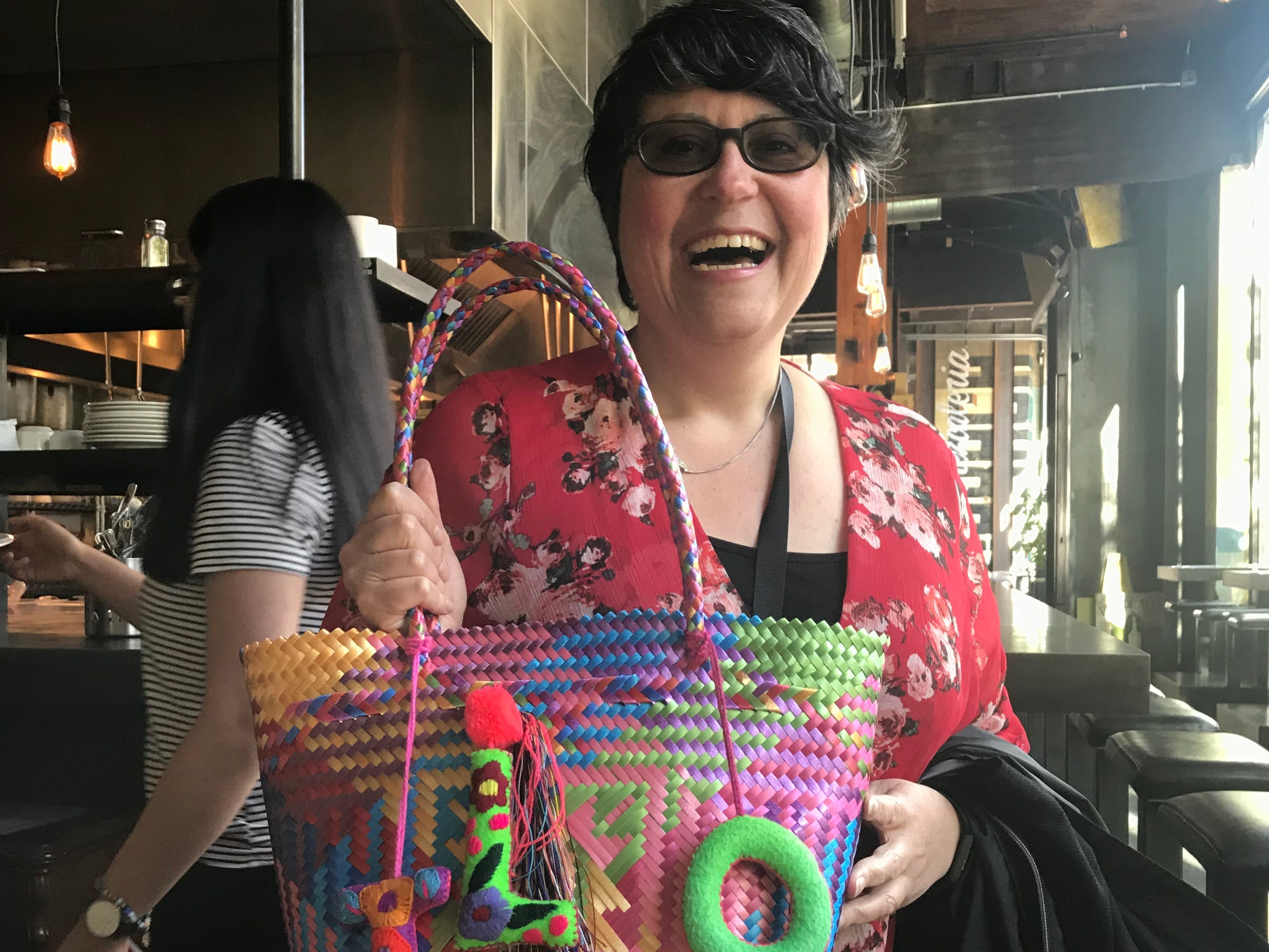 Woman posing with a bag