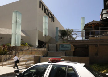 Officer Injured in Gun-Controlled California, Suspect Remains at Large