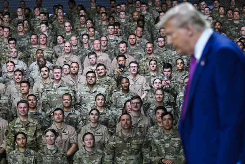 President Donald Trump arrives to address troops at the Al-Udeid air base southwest of Doha, Qatar, on May 15, 2025.