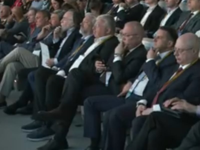 A crowd of people at a conference
