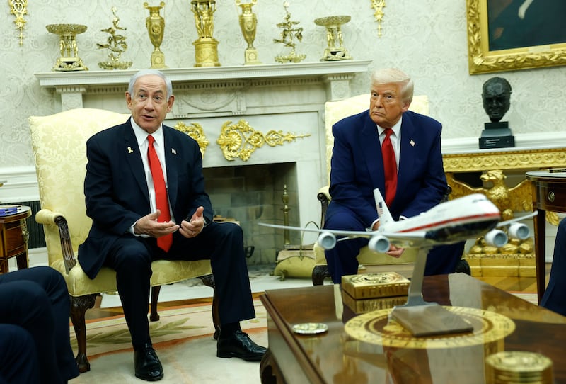 WASHINGTON, DC - APRIL 07: U.S. President Donald Trump (R) speaks alongside Israeli Prime Minister Benjamin Netanyahu with a model of Air Force One on the table, during a meeting in the Oval Office of the White House on April 7, 2025 in Washington, DC. President Trump is meeting with Netanyahu to discuss ongoing efforts to release Israeli hostages from Gaza and newly imposed U.S. tariffs. (Photo by Kevin Dietsch/Getty Images)