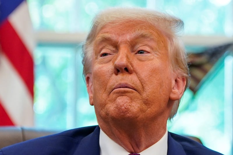 U.S. President Donald Trump reacts in the Oval Office at the White House, in Washington, D.C., U.S., June 10, 2025. REUTERS/Nathan Howard