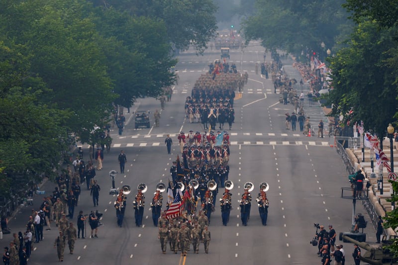 Soldiers and an army band march during a military parade to commemorate the U.S. Army's 250th Birthday in Washington, D.C.